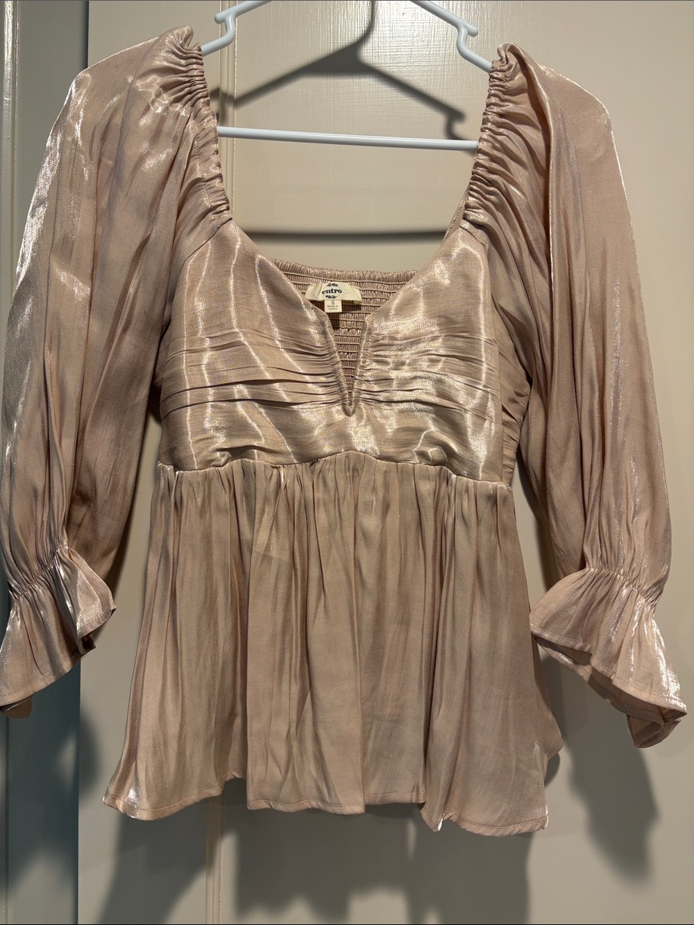 Shimmery Blouson Peplum Top in Champagne